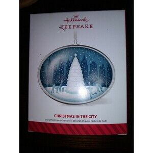 Hallmark 2014 Christmas in the City Ornament Artist crafted and metal